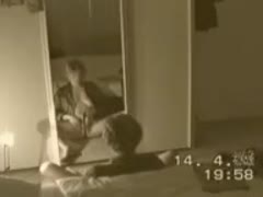 In front of the mirror, a horny ex-wife is using a sex toy to masturbate.